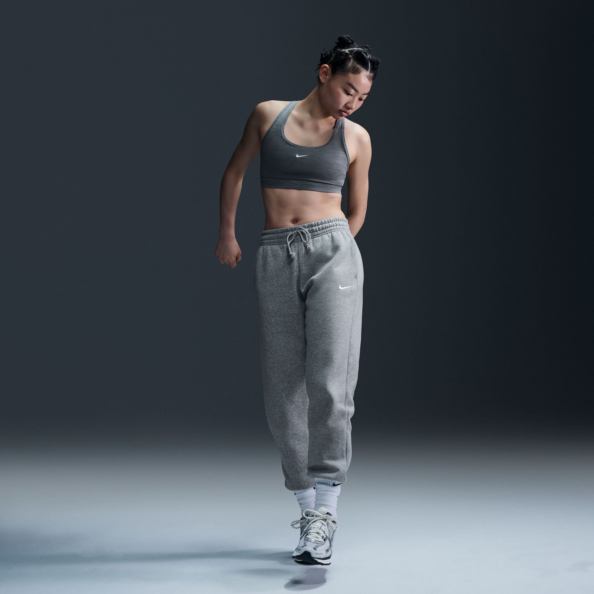  Women's Nike Swoosh Light Support Bra - DX6817-085
