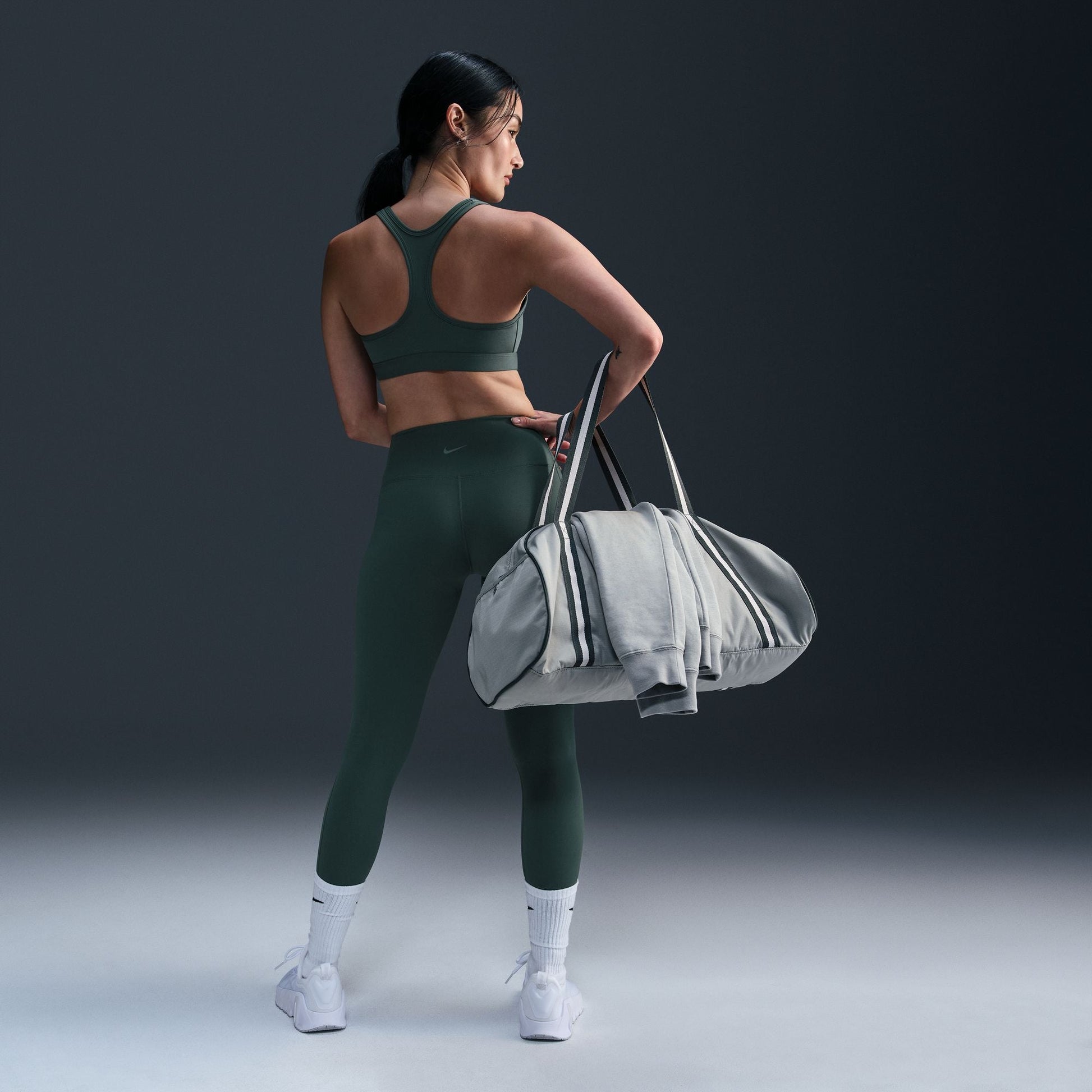  Women's Nike Swoosh Light Support Bra - DX6817-338