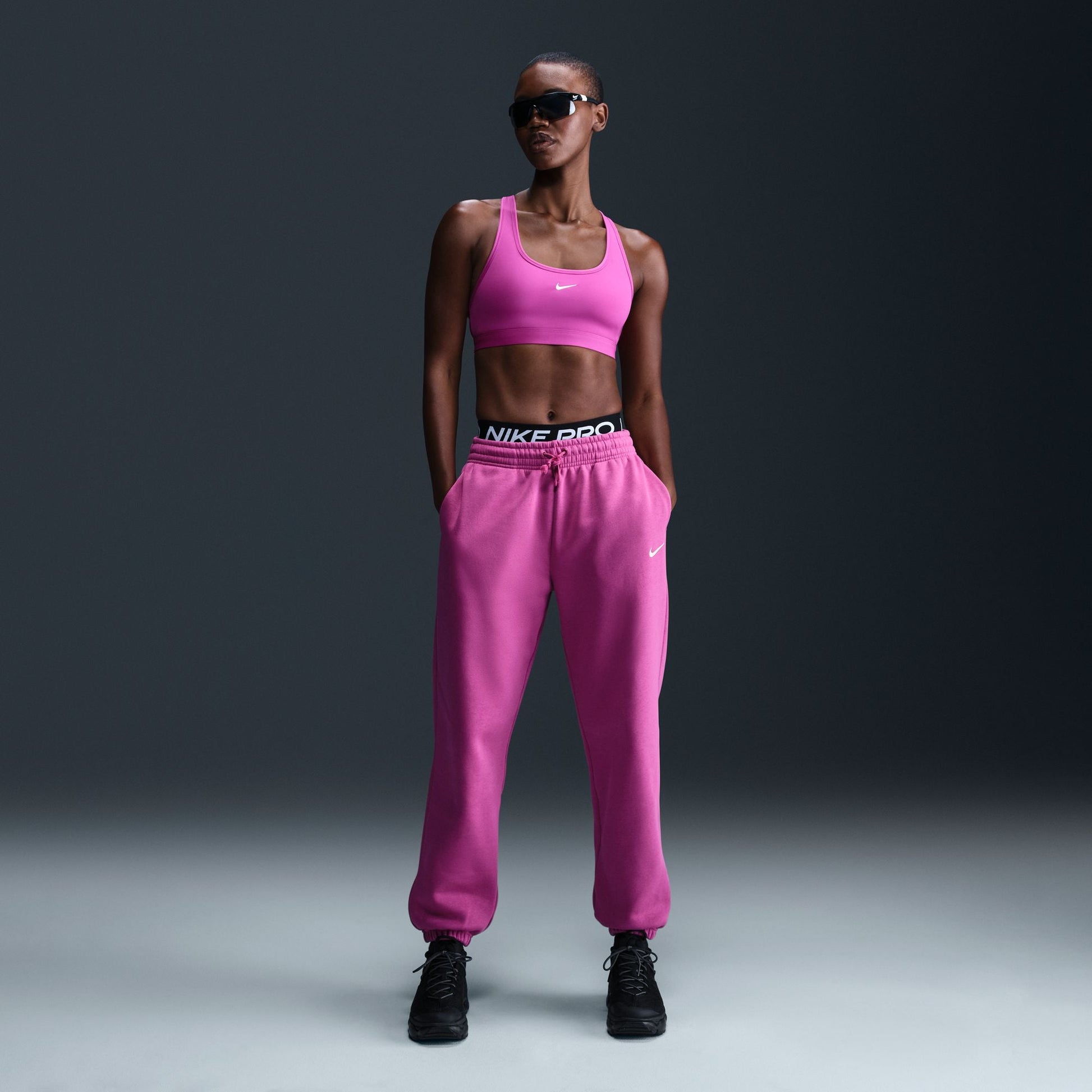  Women's Nike Swoosh Light Support Bra - DX6817-518